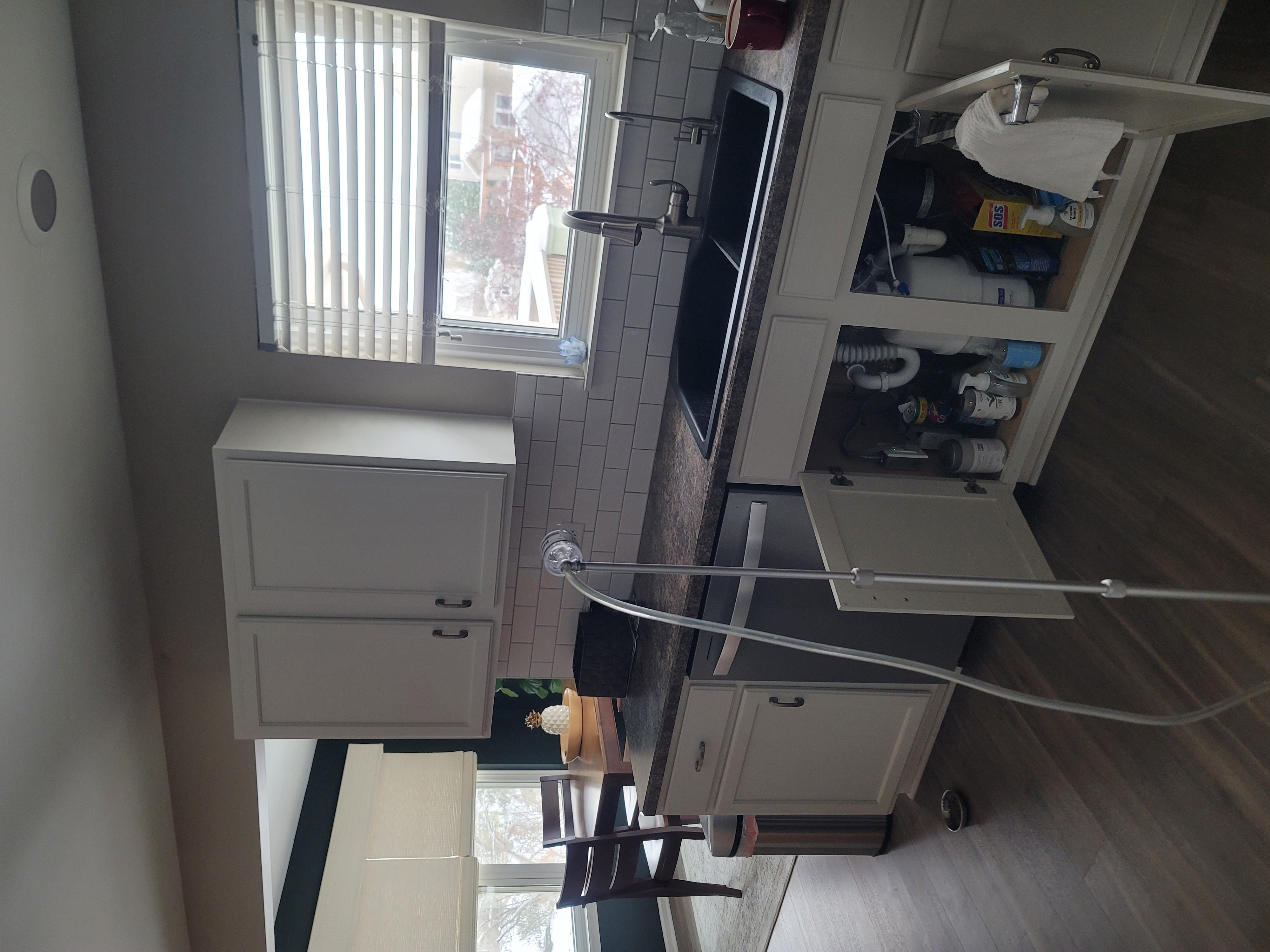 Professional mold testing and air sampling being performed in South Florida kitchen